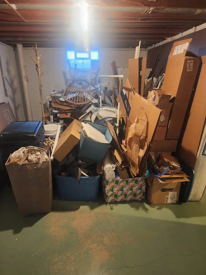 Roll-off dumpster container at job site for 2 Yard Dumpster Rental in Sky Lake